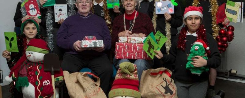 Pupils from Cramond Primary School deliver presents to the elderly for Christmas appeal