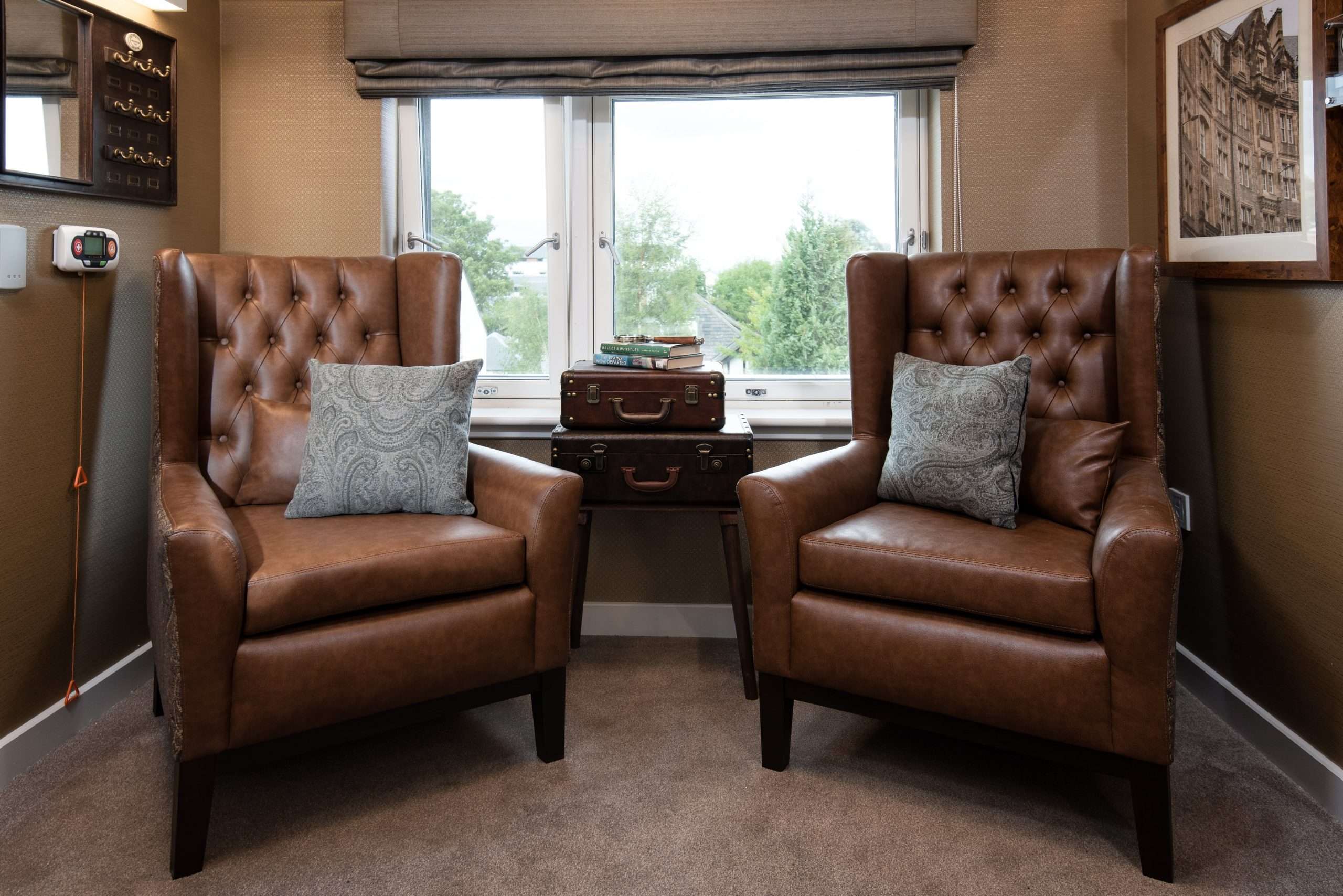 Snug with two chairs at Cramond residence