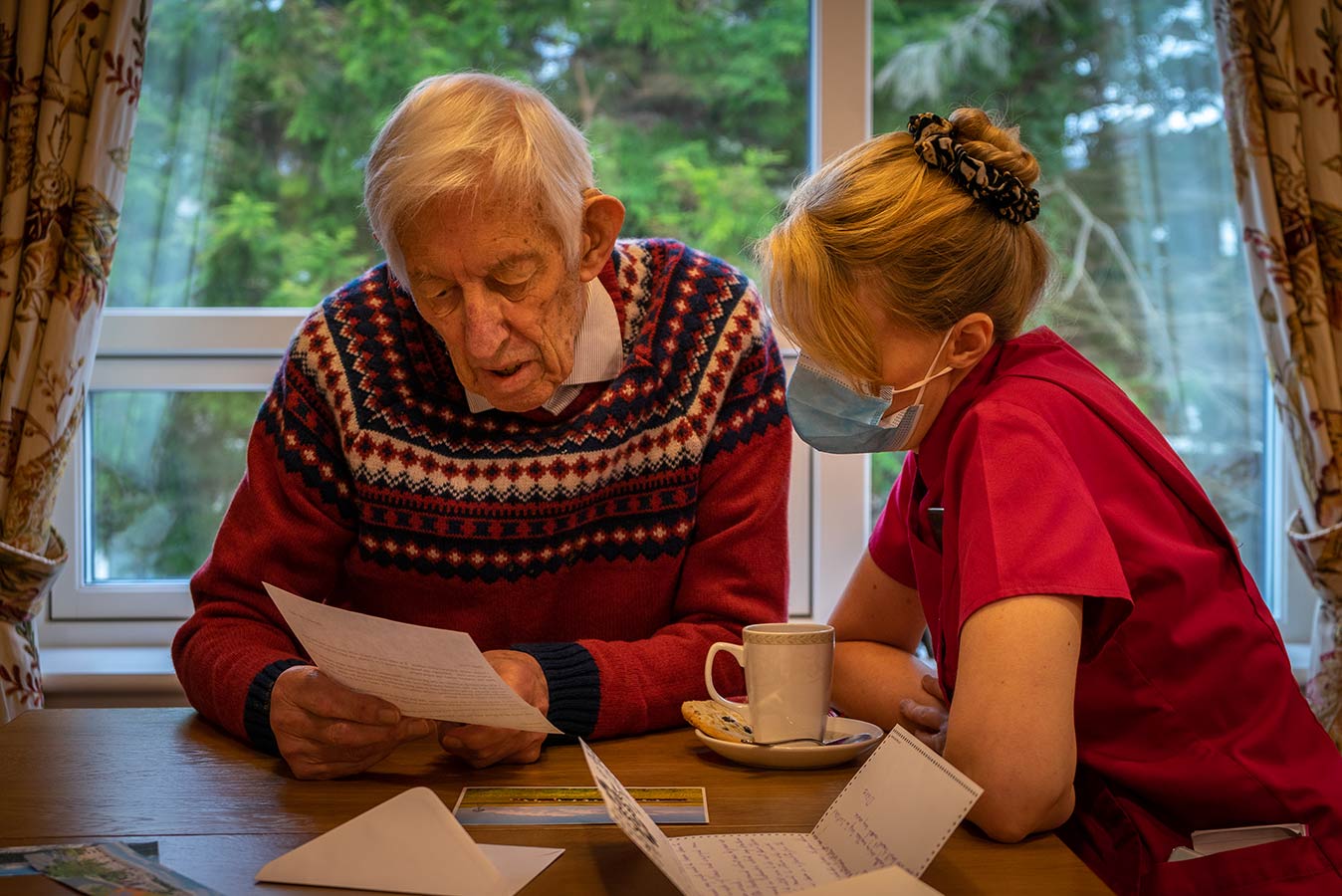 A resident and member of staff read a letter