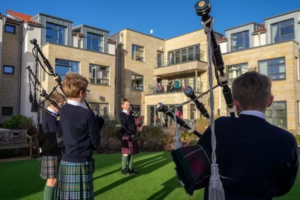School pipe band performance keeps elderly residents in tune